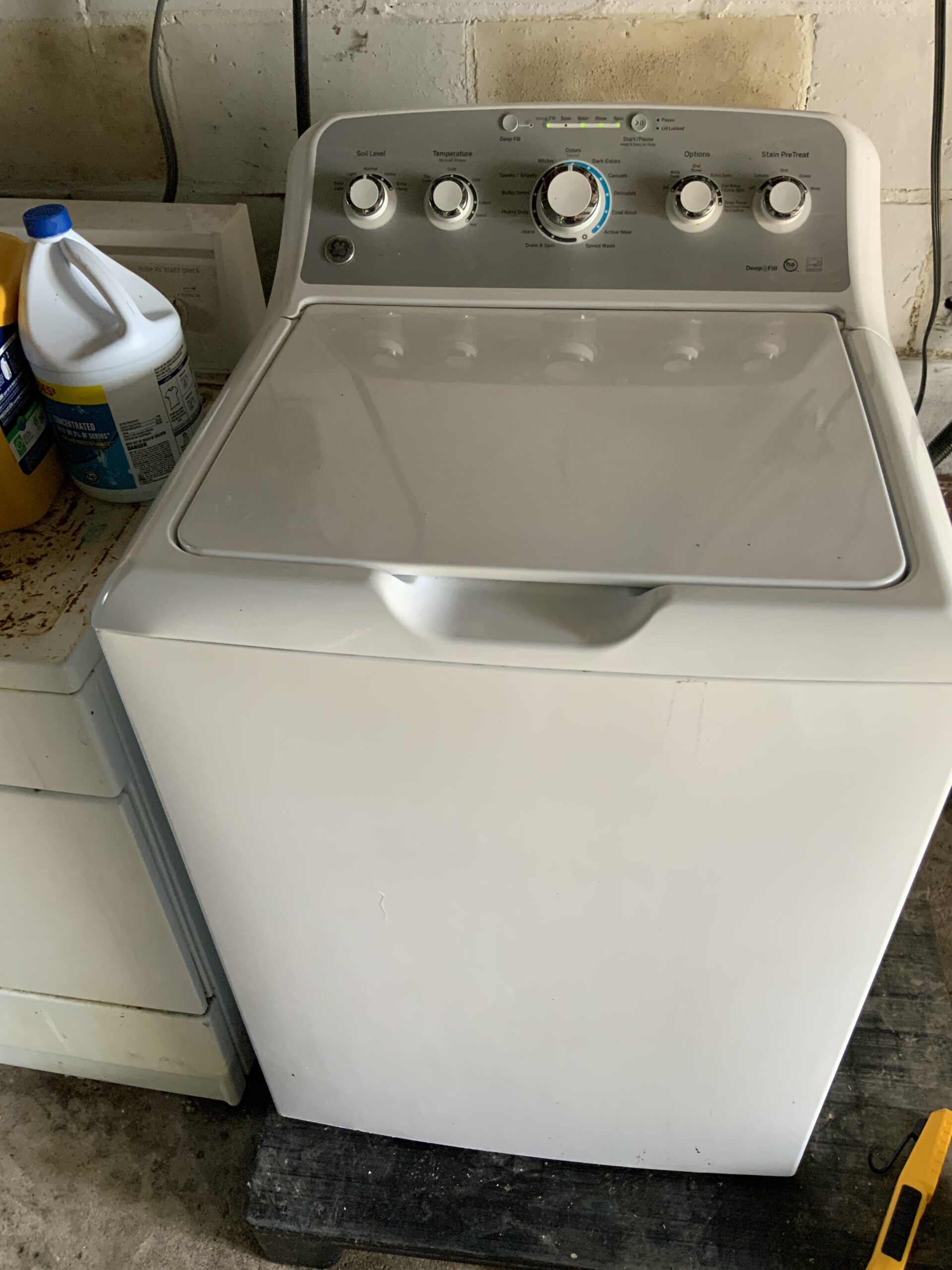 GE washer model GTW485ASJ1WS serviced by Louisville Appliance Repair with lid switch and water valve replacement.