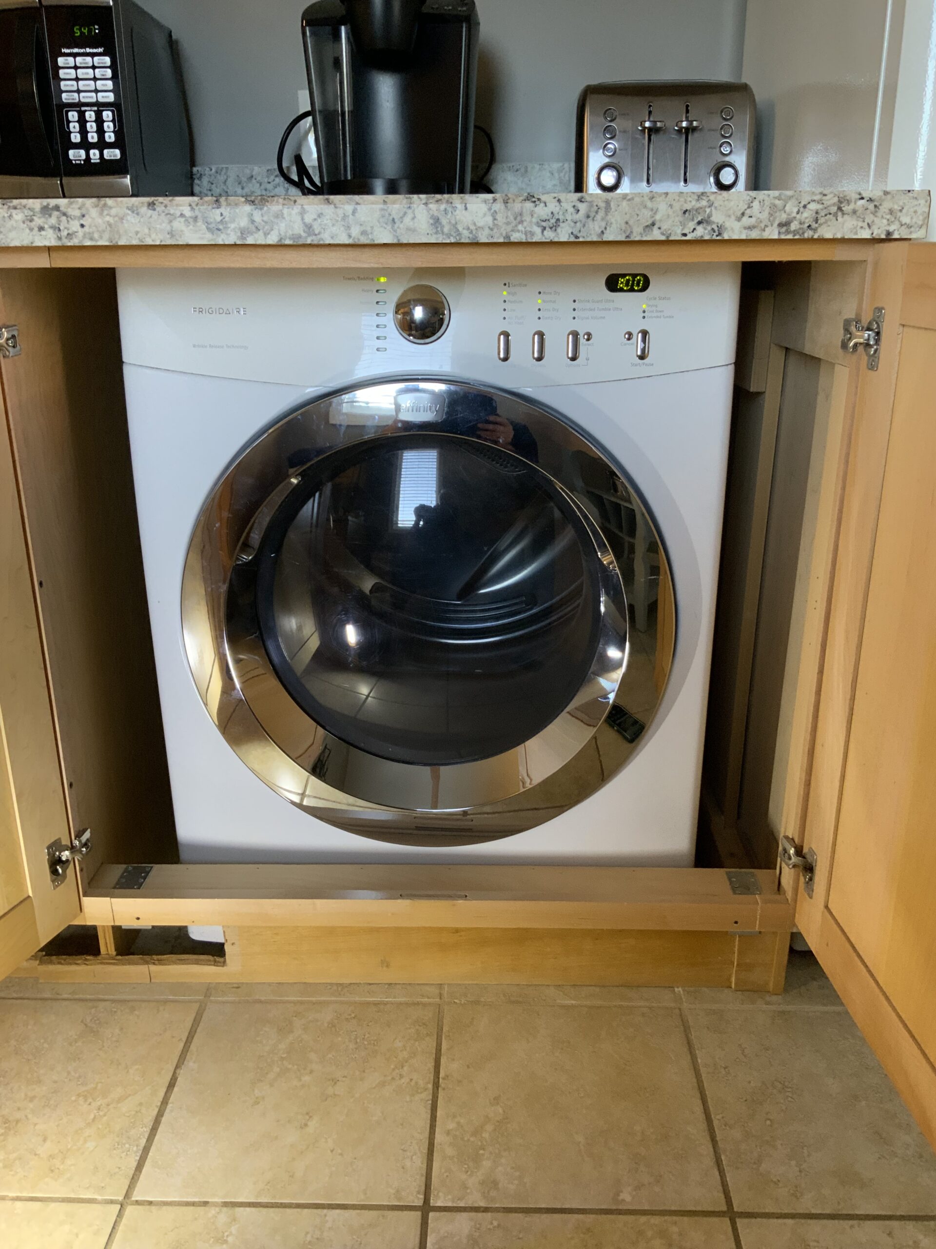 Frigidaire INFINITY dryer with newly repaired door latch in Louisville, Ohio.