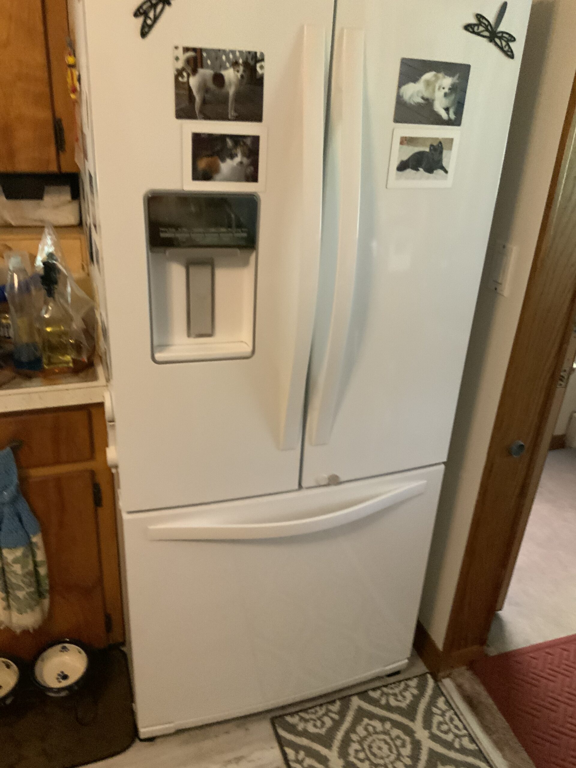 Whirlpool refrigerator model WRF560SEYW00 ice maker repaired by technician Samuel Willhite in Louisville, OH.