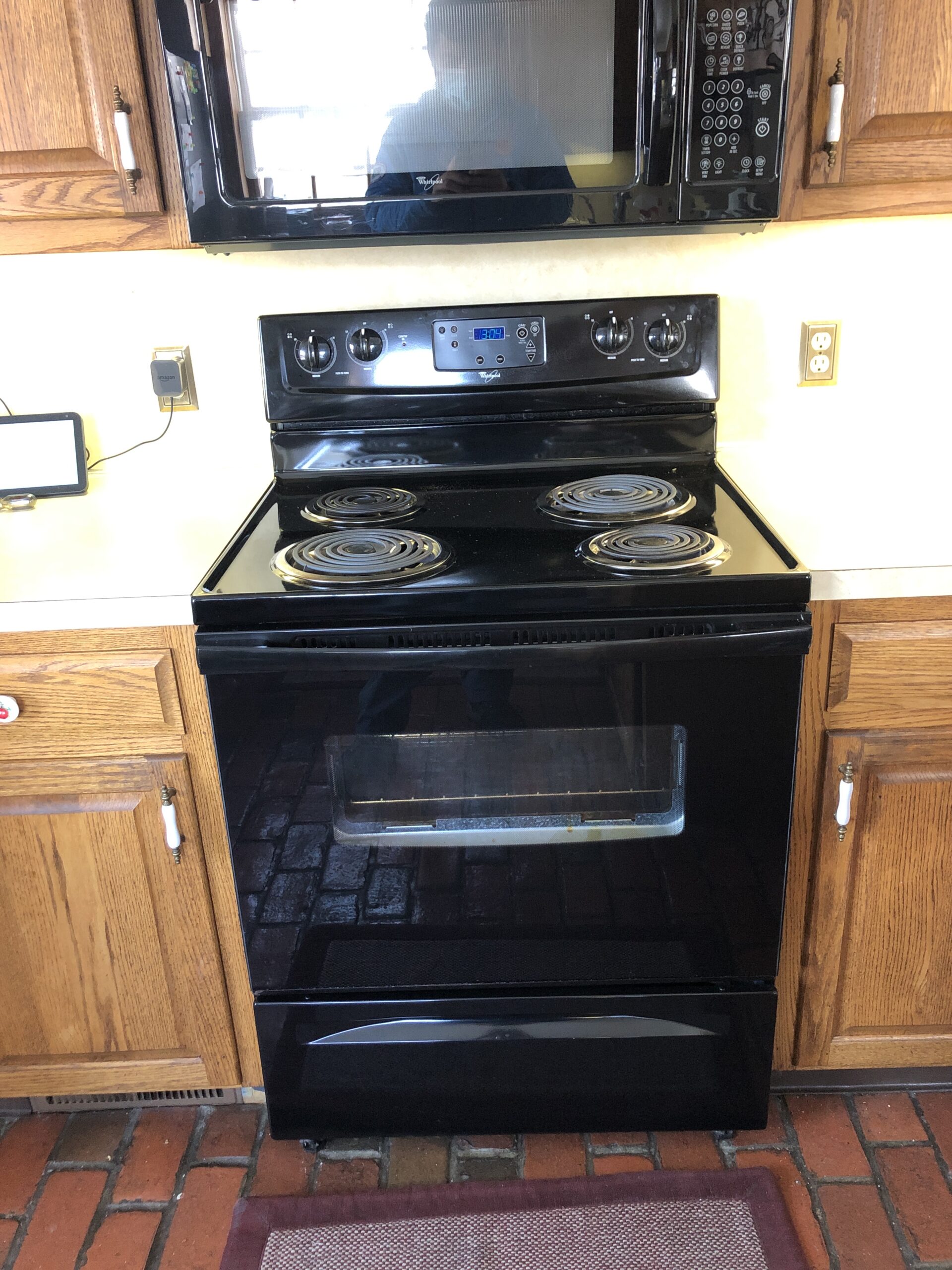 Whirlpool RF114PXSB3 stove showing replaced burner switches in Louisville, Ohio.