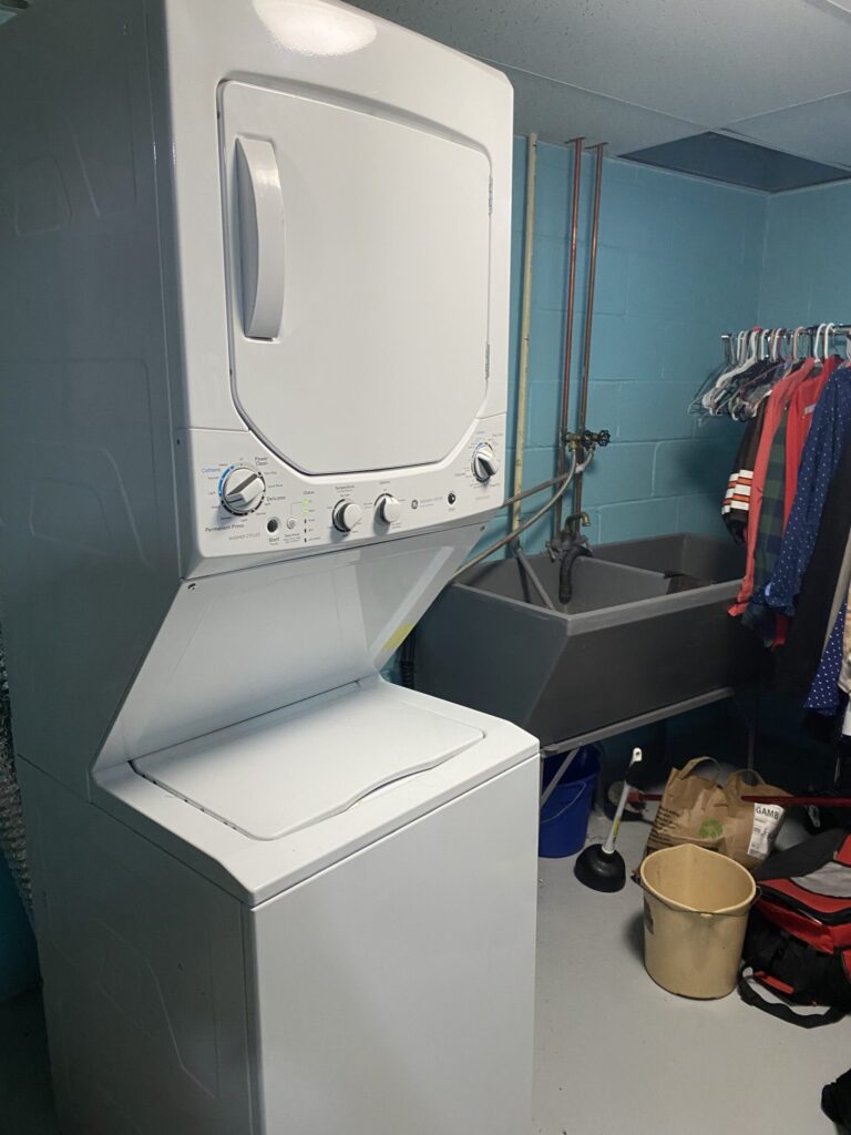GE washer (GUD24ESSJOWW) — Canton, OH