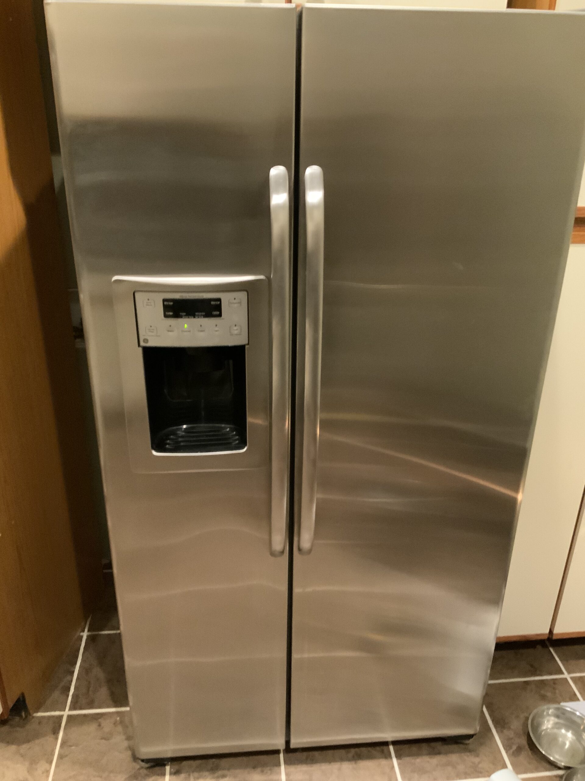 Samuel Willhite repairs GE LSS25XSWASS refrigerator defrost heater in Canton, OH.