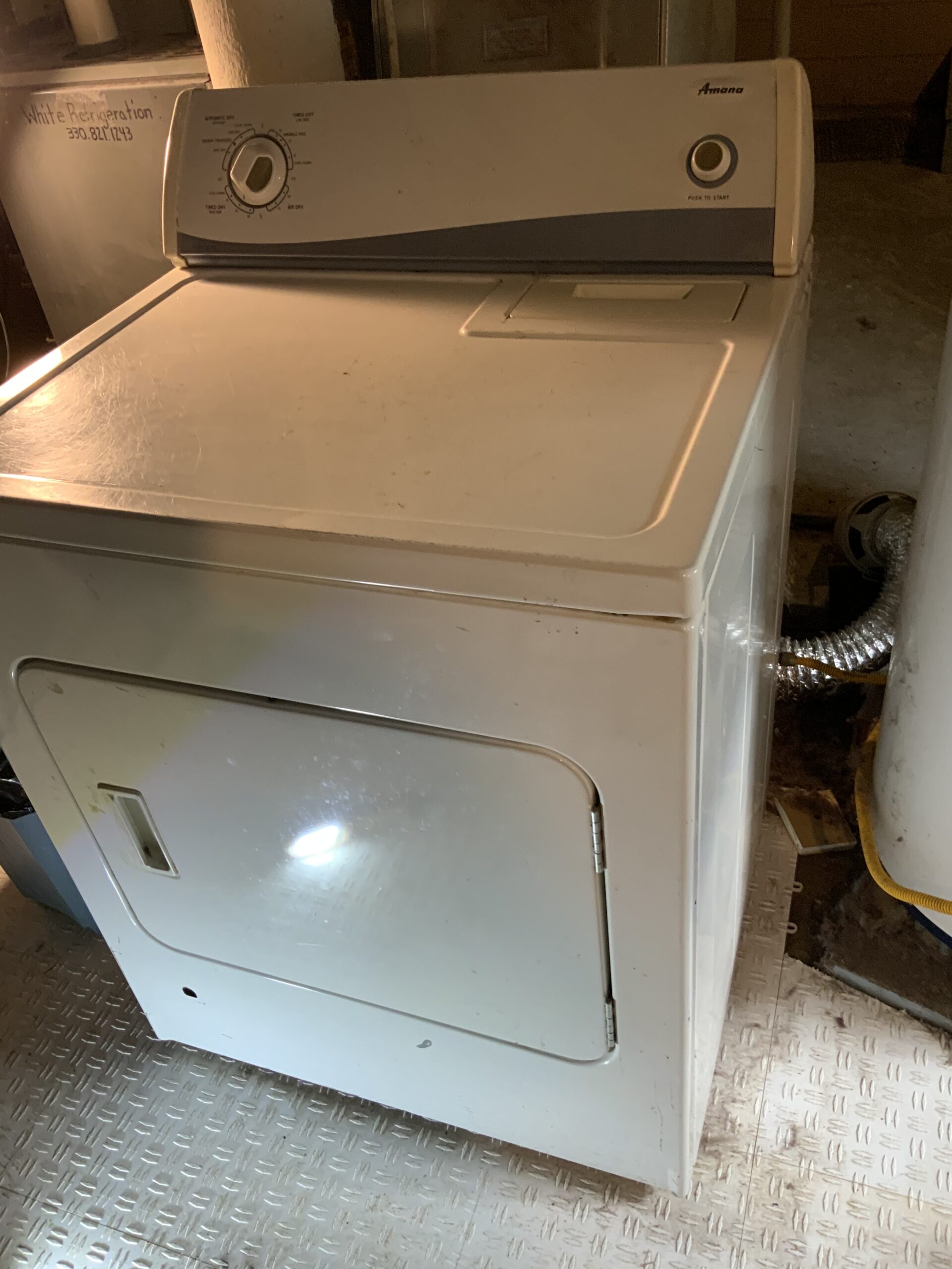 Image of an Amana NGD5100TQ1 dryer after repair in Alliance, Ohio.