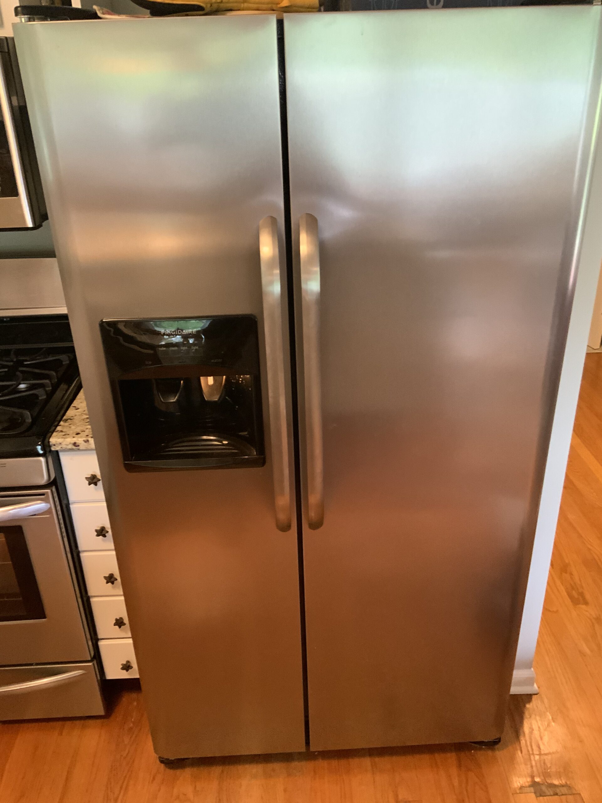 Frigidaire FFHS2611PFEA refrigerator with ice maker repaired by technician in Malvern, Ohio.