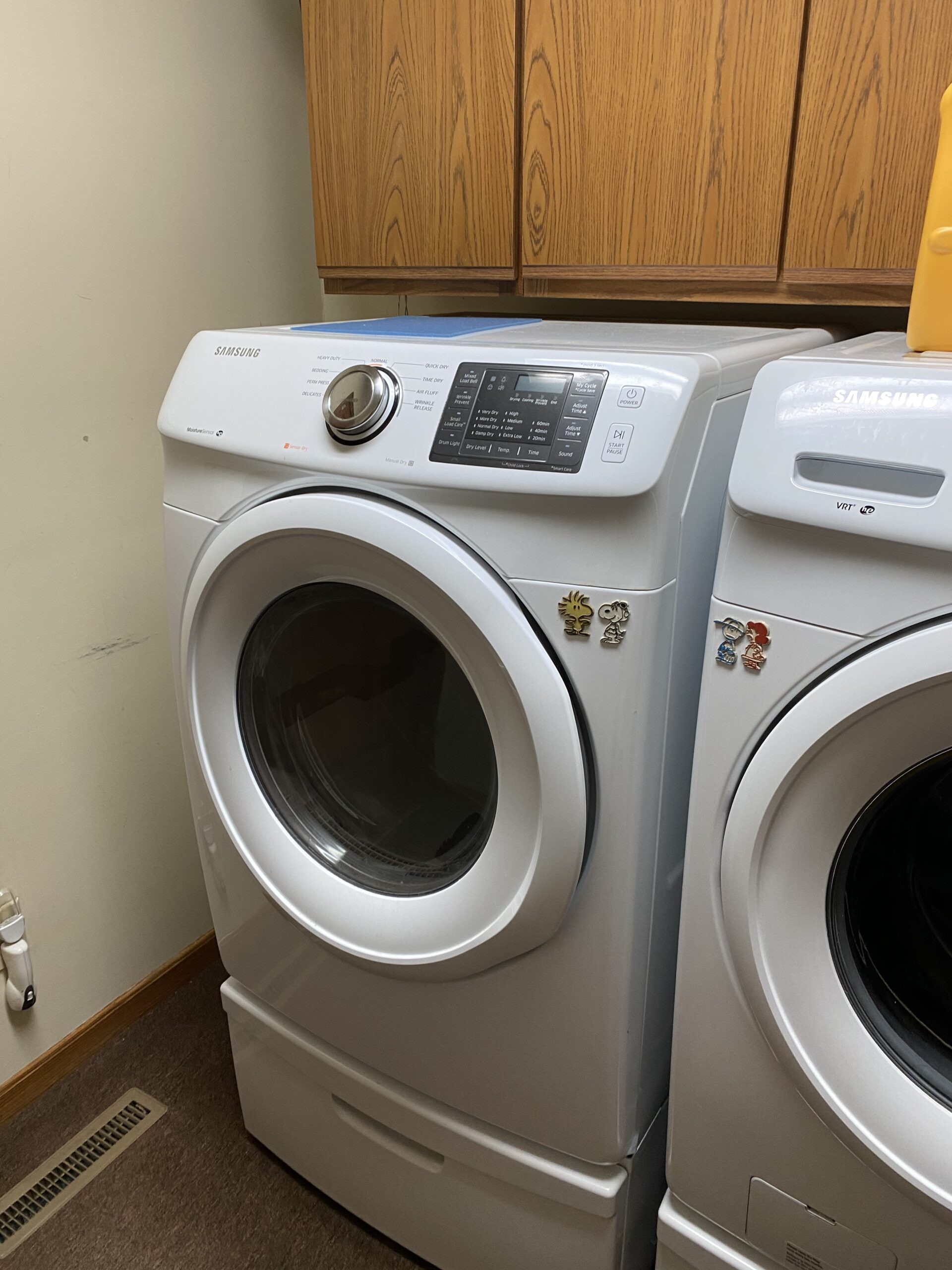 Samsung dryer DV42H5000EW with new heat element assembly and idler pulley, serviced in Alliance, Ohio.