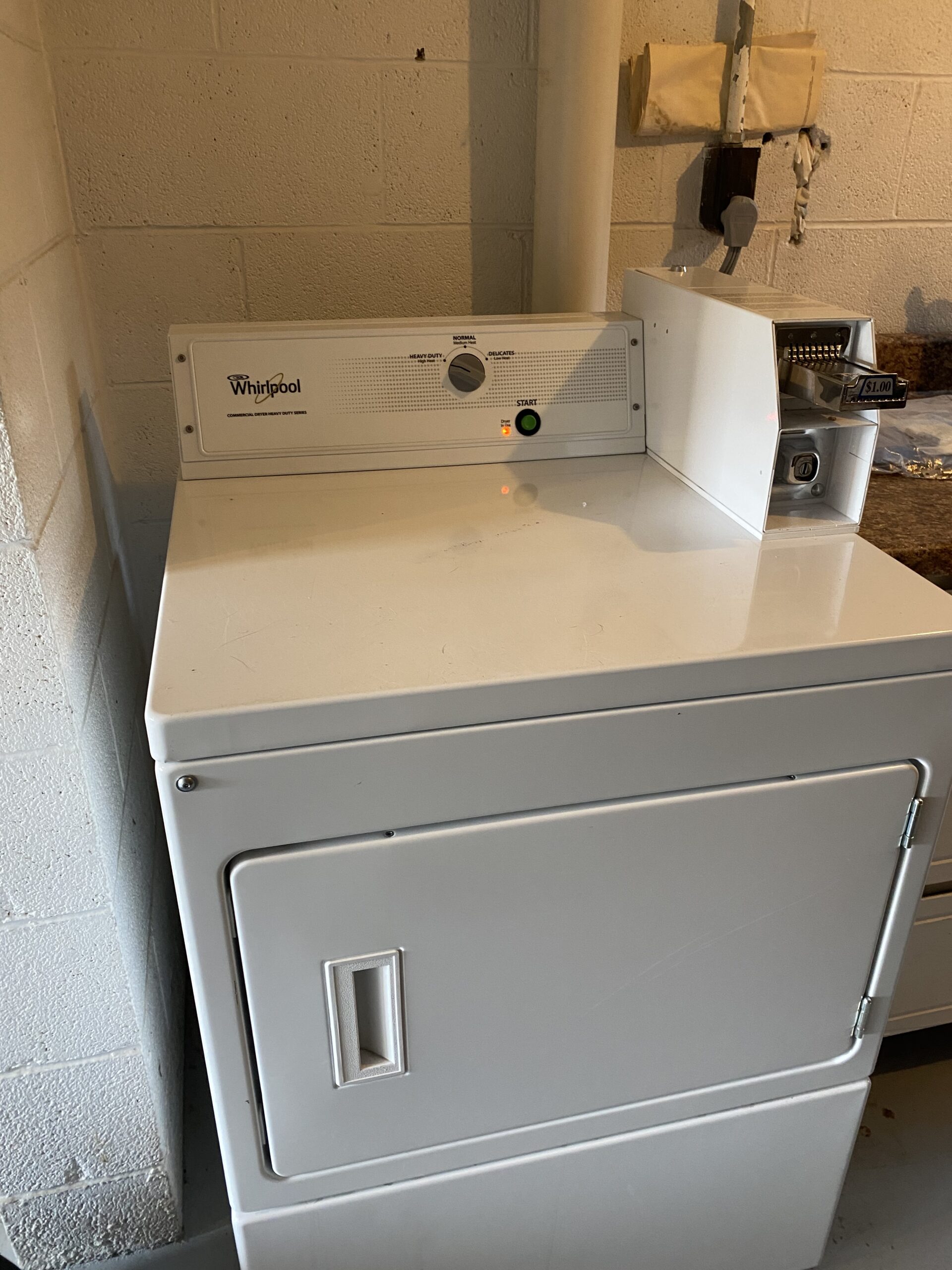 Whirlpool dryer model CEM2743BQ0 showing repaired heating component by Samuel Willhite.