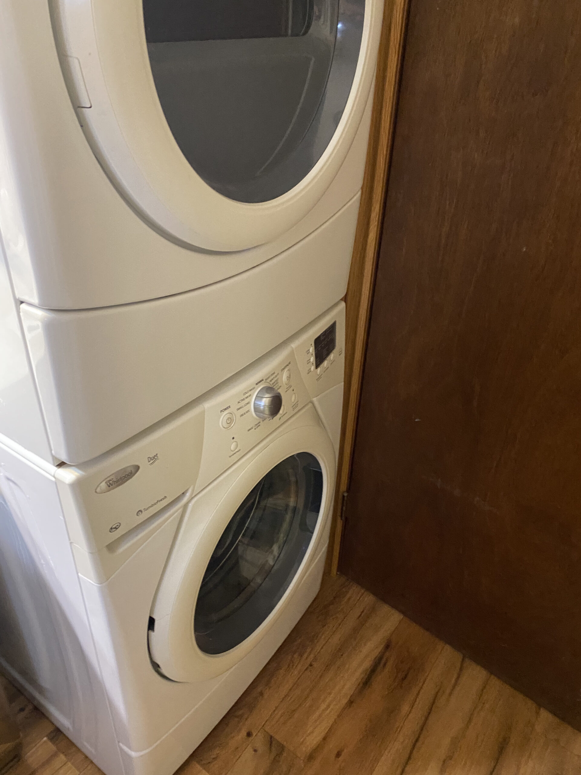 Whirlpool Washer Model WFW9151YW00 with repaired wiring harness and replaced drain pump.