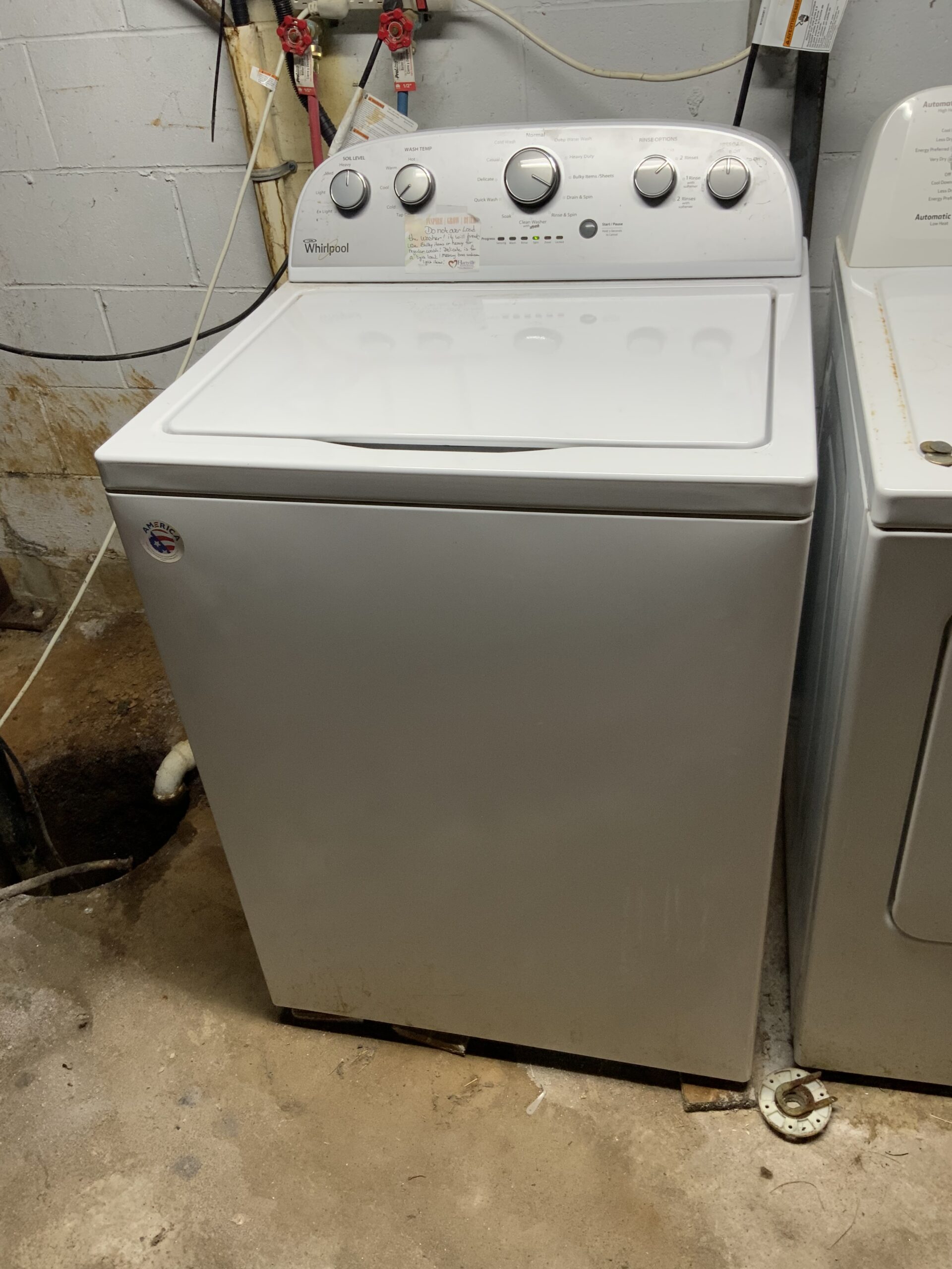 Image of repaired Whirlpool WTW5000DW2 washer showing replaced drive hub in Louisville, OH.