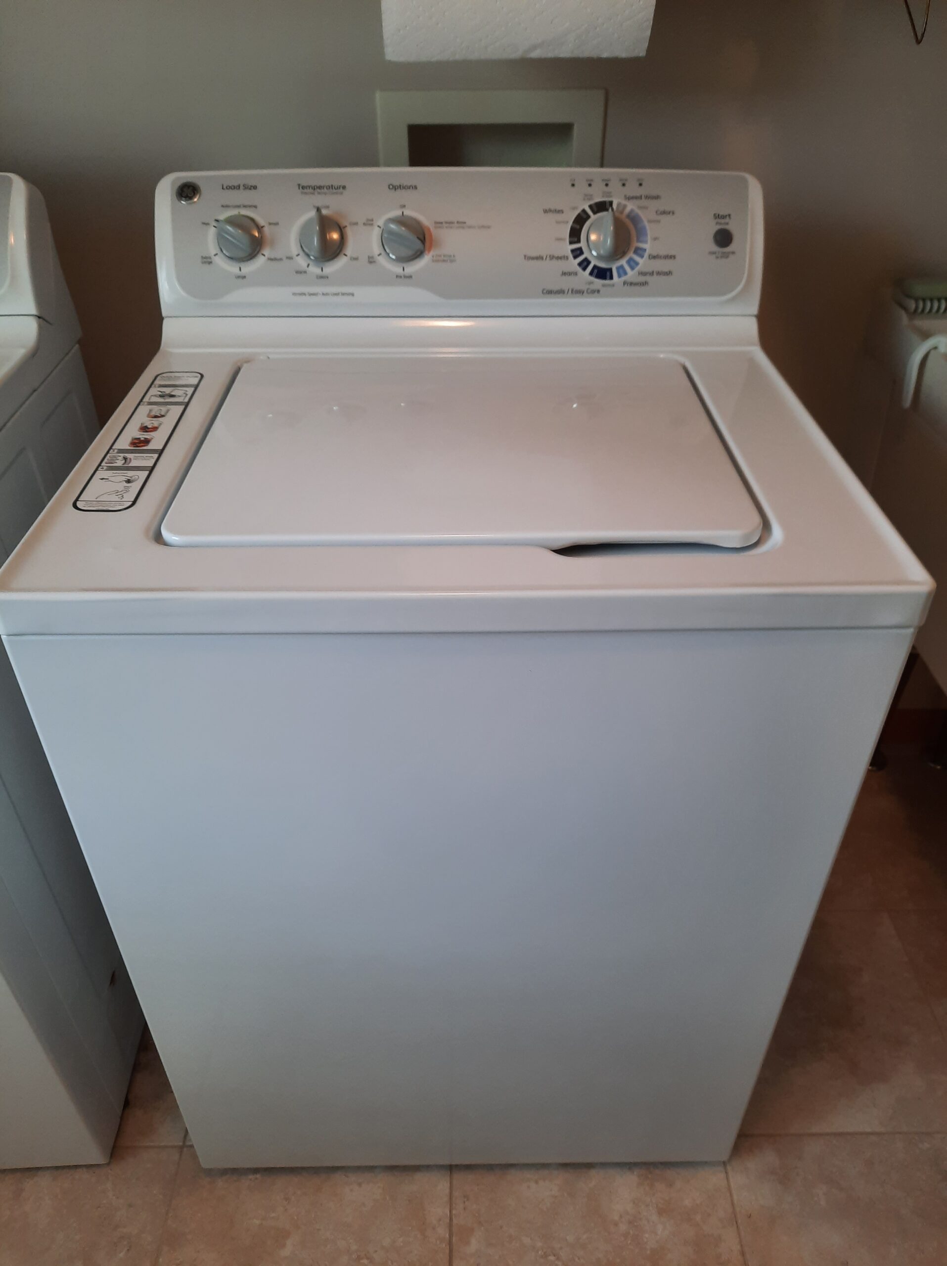 GE washer model GTWN4250D2WS repair in Canton, Ohio addressing grinding noise.