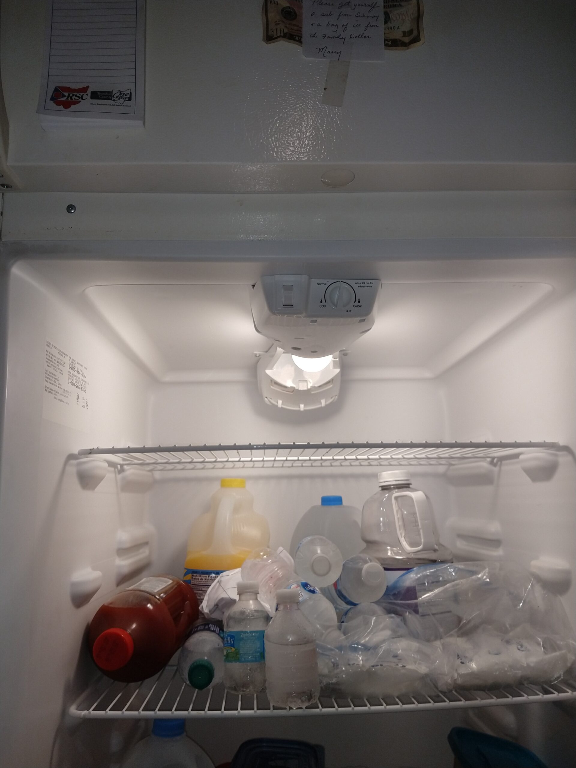 Admiral FFTR1713LQ1 refrigerator with a defrost timer repair in progress.