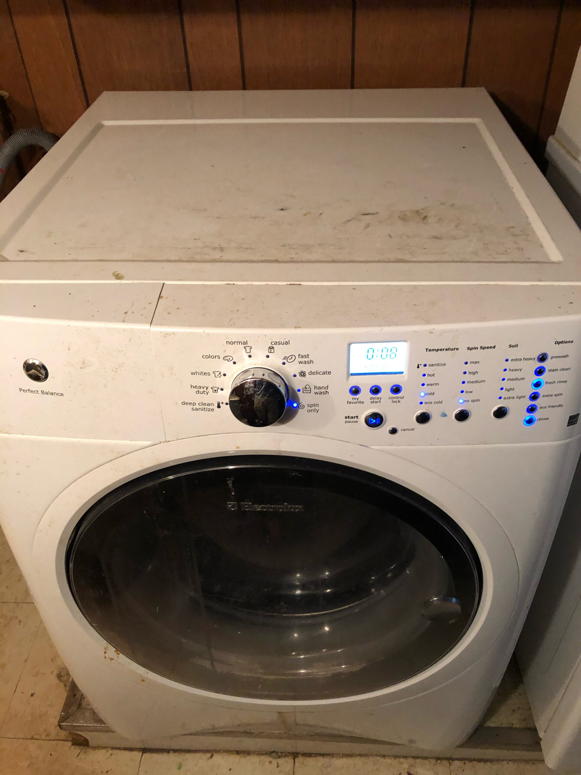 Electrolux front load washer repair, model EIFLW50LIW1, showing drain pump replacement.