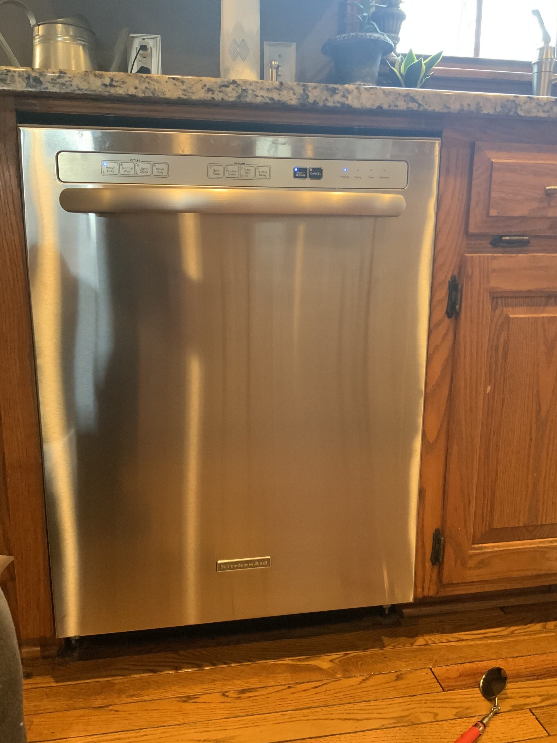 KitchenAid dishwasher model KUDK03CTSS3 shown after door gasket replacement by technician in Louisville, Ohio.