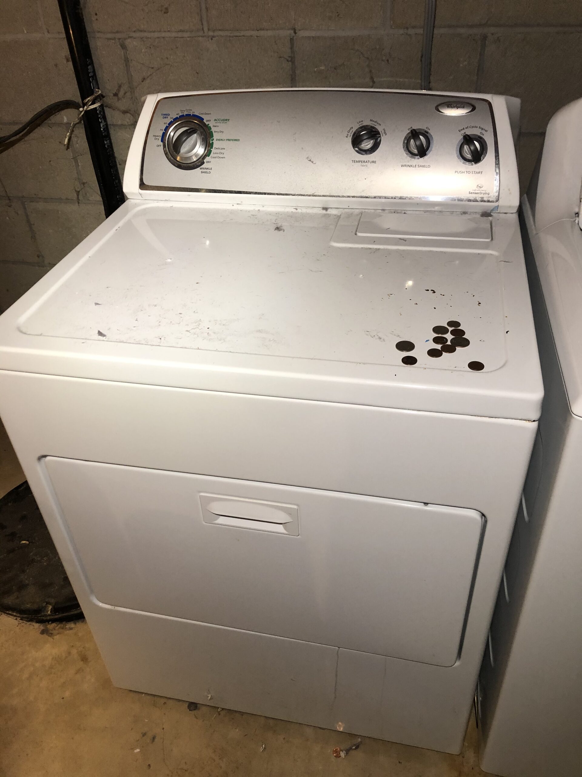 Whirlpool WED4900XW0 dryer repair in Hartville by technician Samuel Willhite