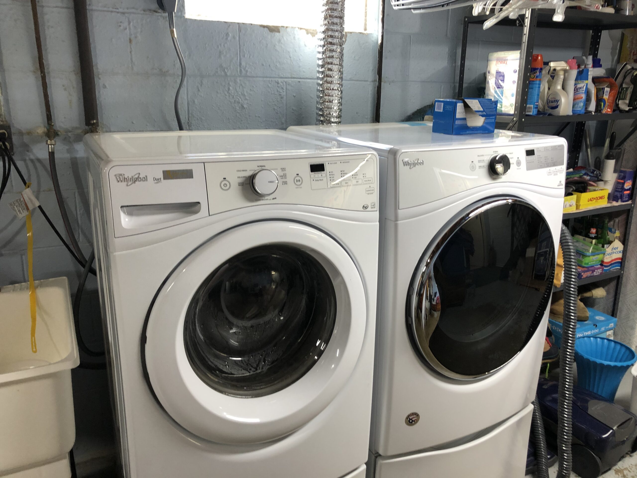 Whirlpool Front Load Washer Model WFW72HEDW0 repair showing replaced drain pump and control board.