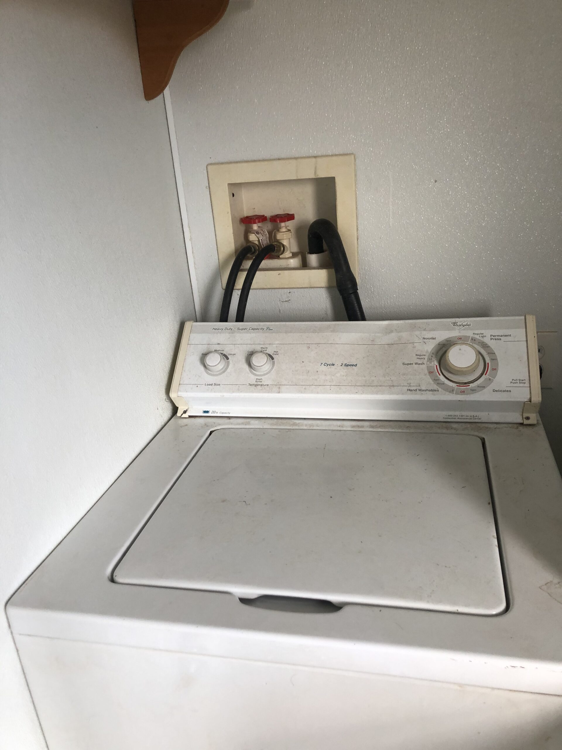 Whirlpool LSR7233DQ0 washer repaired by replacing the motor capacitor in Homeworth, OH.