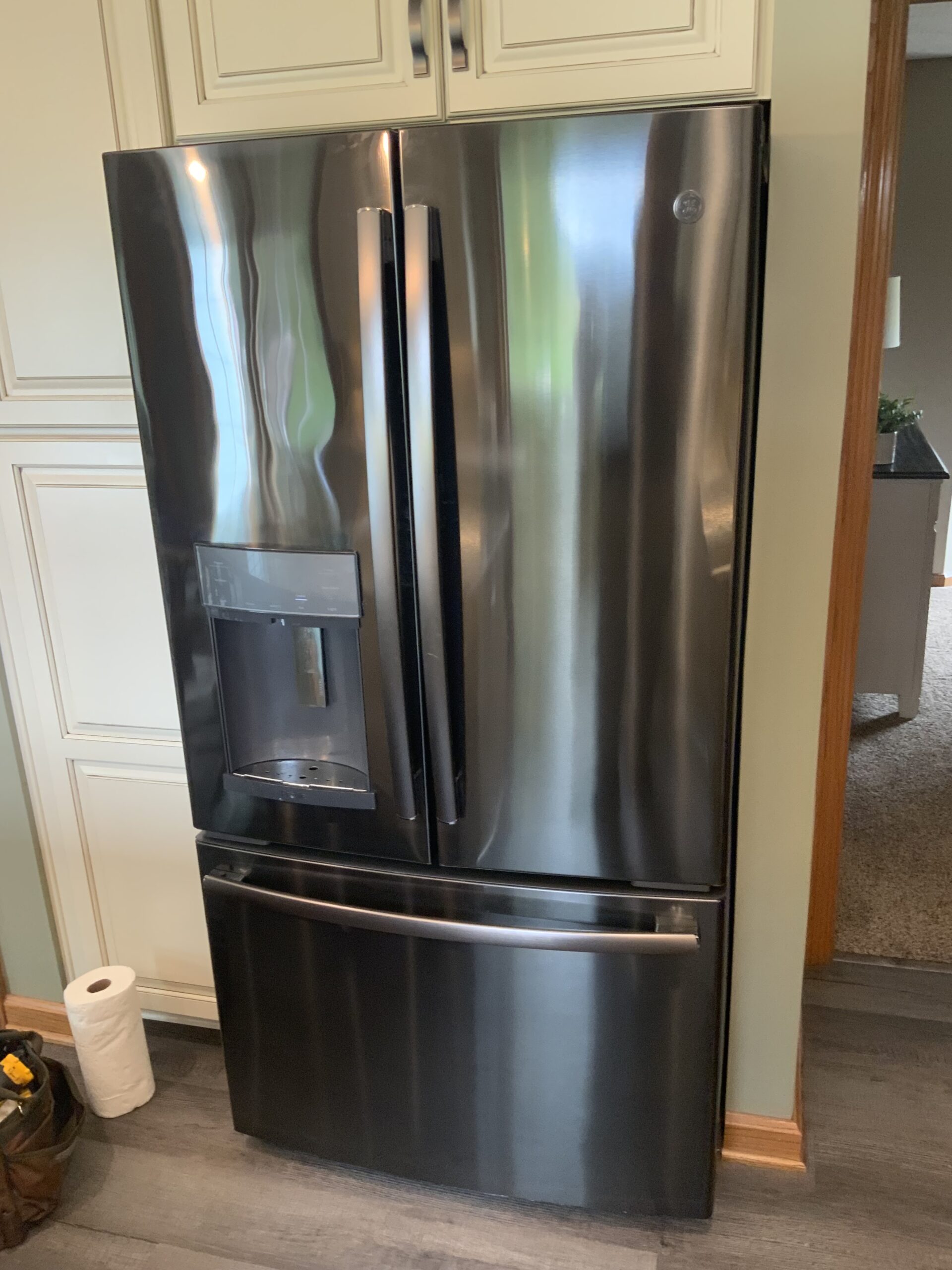 Repaired GE PFE28KBLITS refrigerator by local technician in Louisville, Ohio.