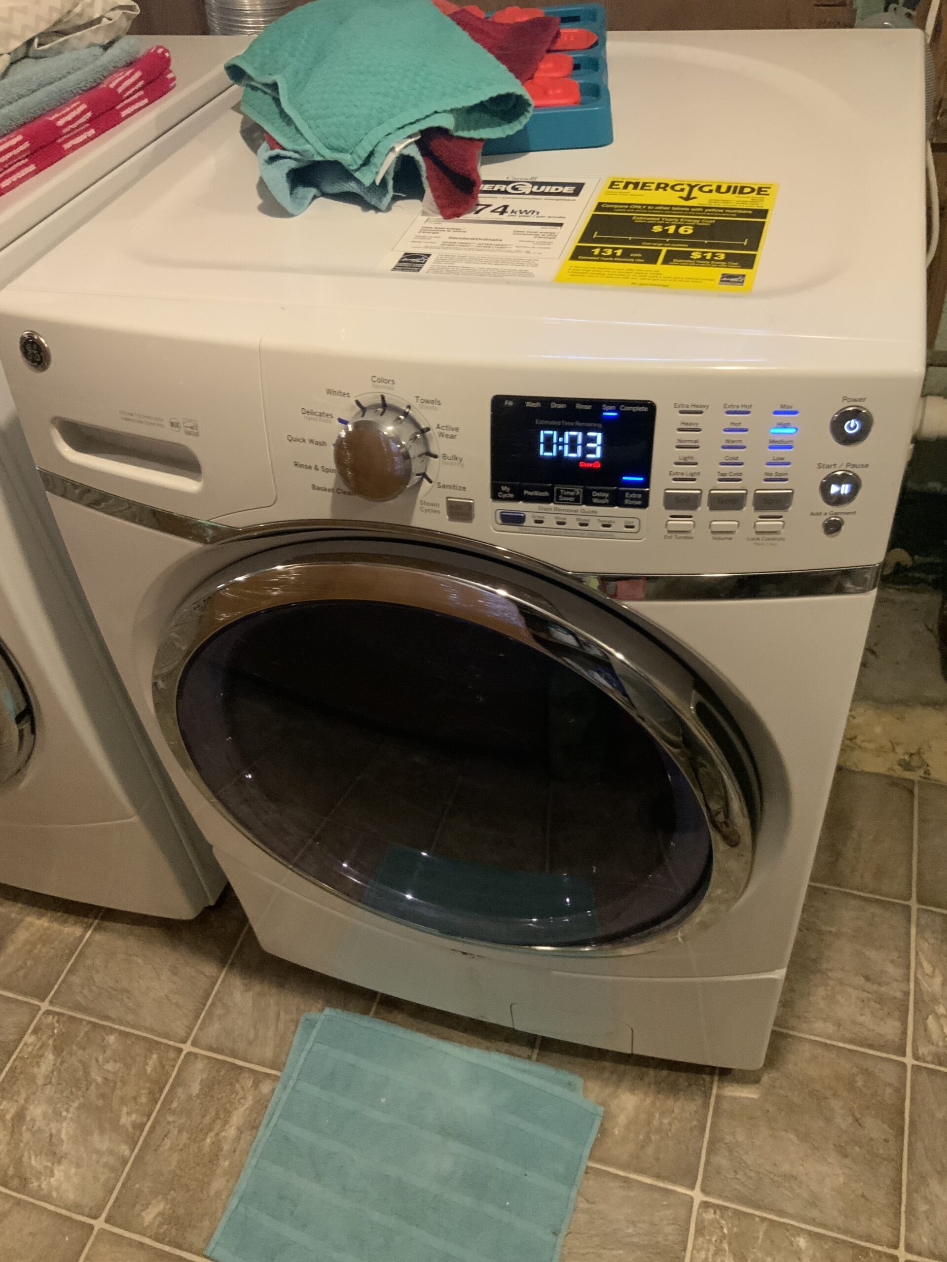 Samuel Willhite repairing a GE GFWS1700H1WW washer in Louisville, Ohio.