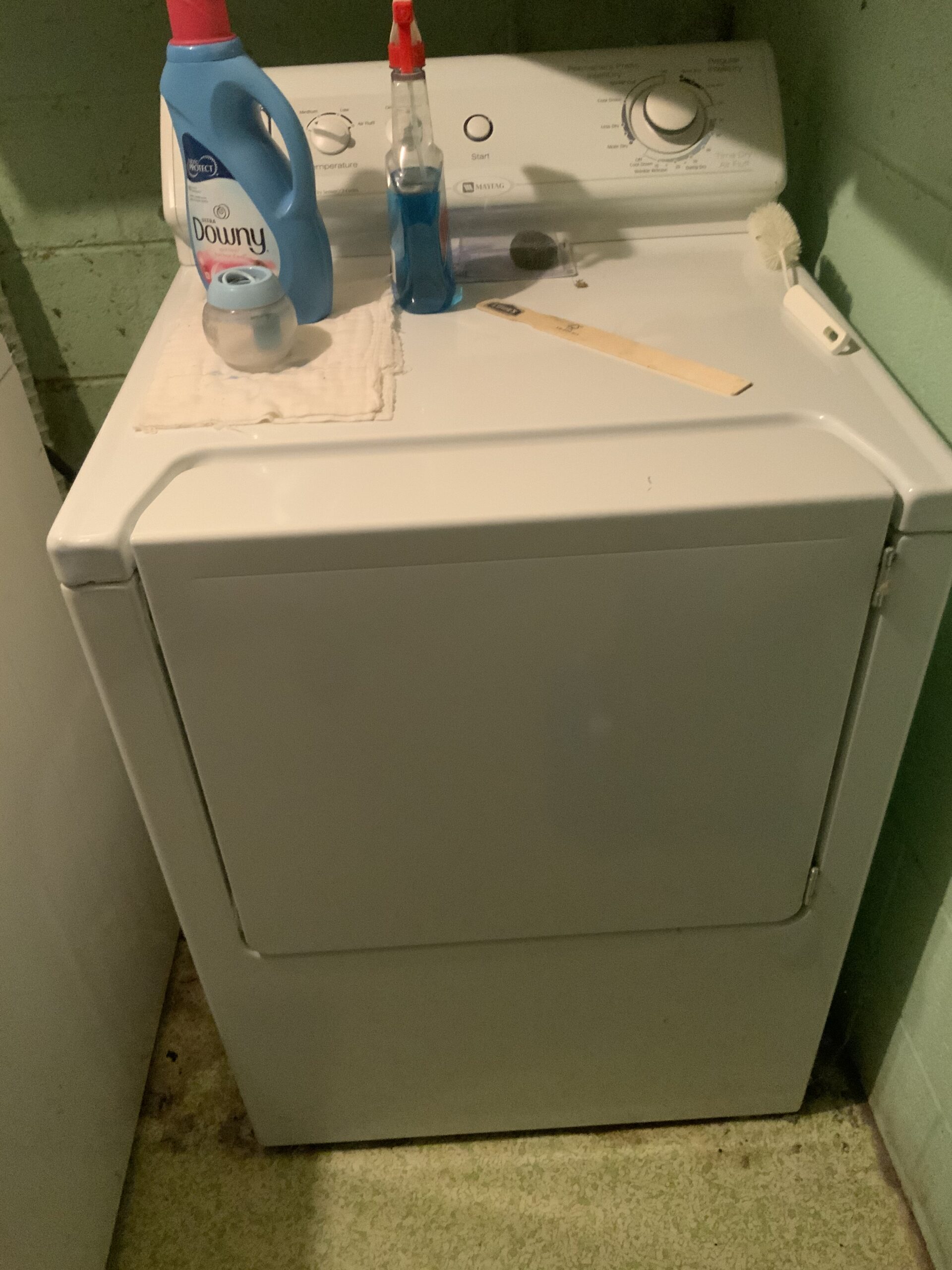 Photo of Maytag MDE3600AYW dryer repair process in North Canton, showcasing rear support roller replacement.