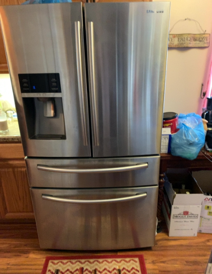 Samsung RF28HMEDBSR/AA refrigerator ice maker repair with new parts.