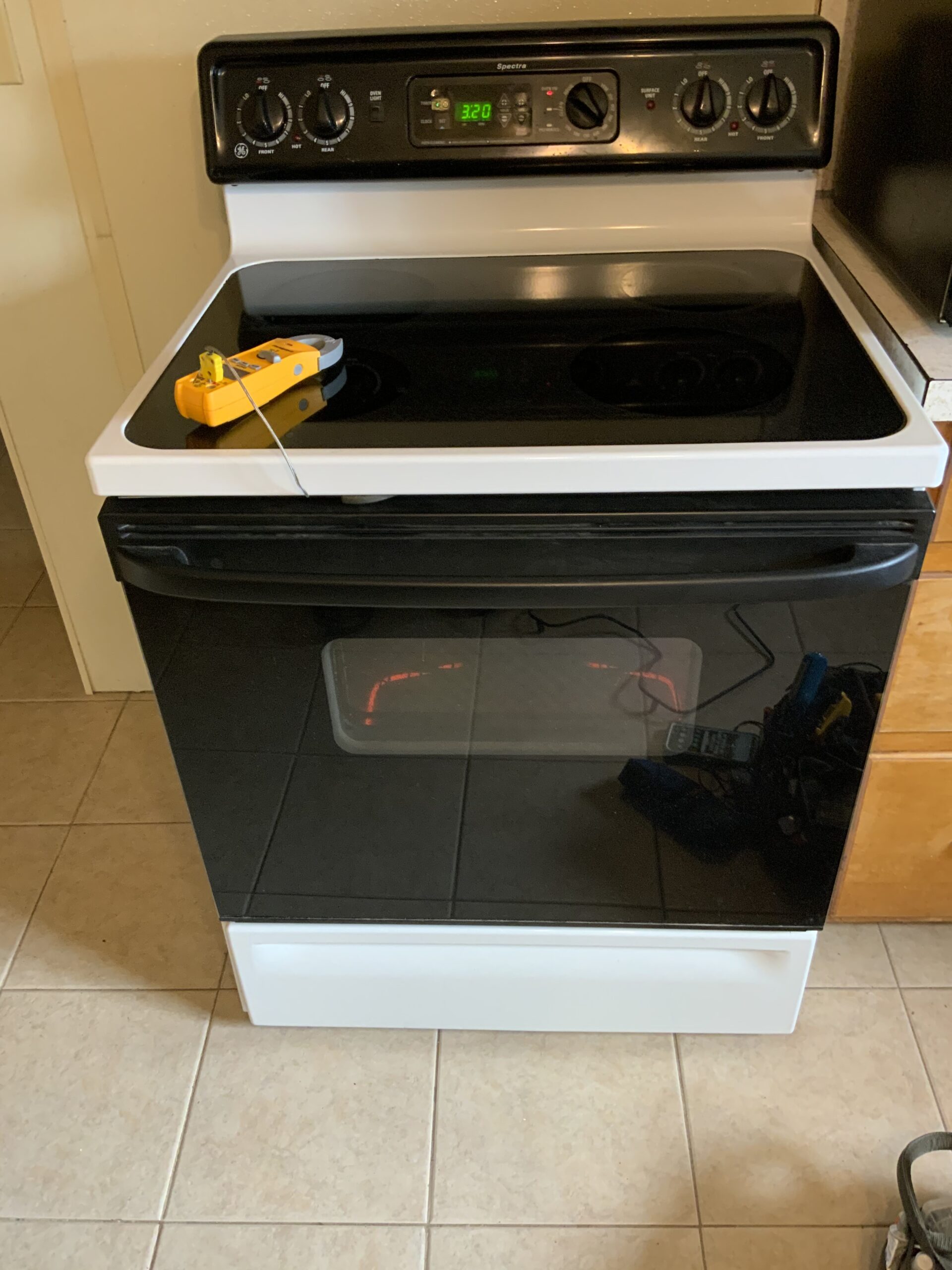 GE oven repair including bake element and surface burner replacement.