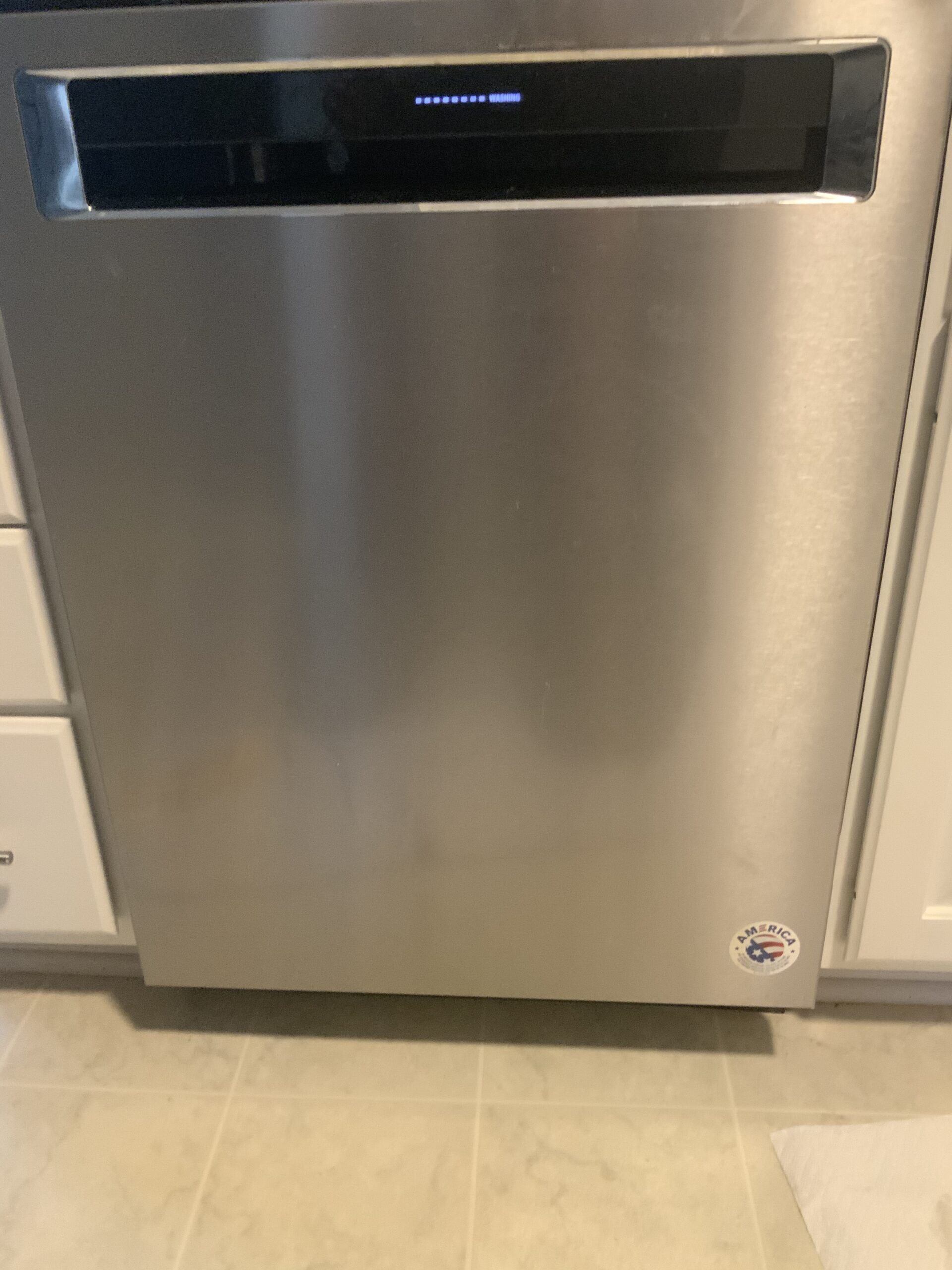 Repair of KitchenAid dishwasher model KDPE234GPS0 in progress.