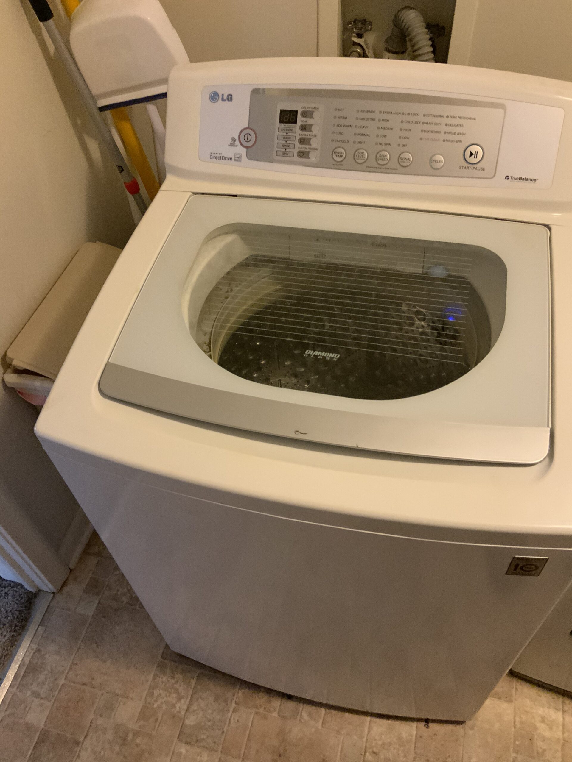 LG washer model WT4801CW undergoing bearing replacement in Hartville, Ohio.