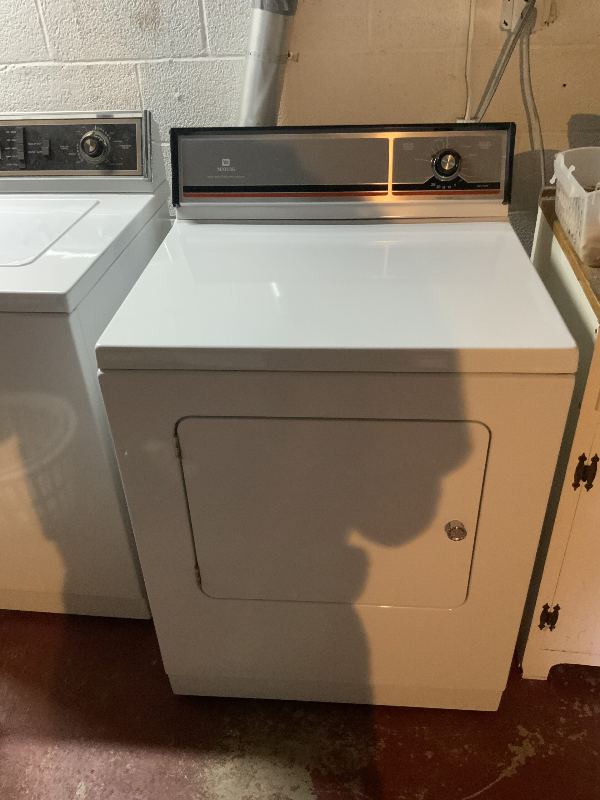 Maytag DE303 dryer repaired by Samuel Willhite in Louisville, Ohio, with replaced drum support wheels.