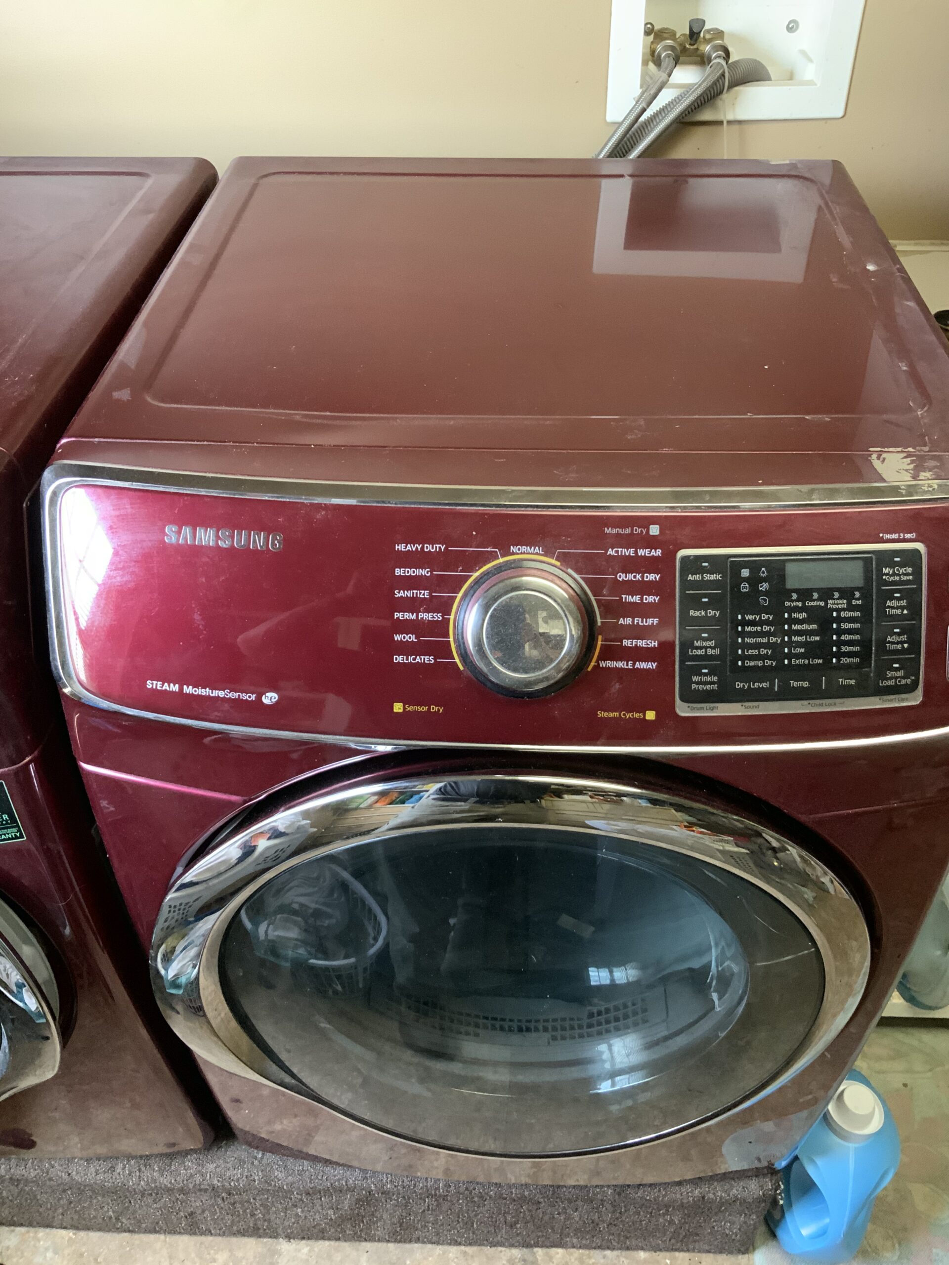 Samsung dryer model DV42H500EF/A3 with replaced idler pulley in Louisville repair session.