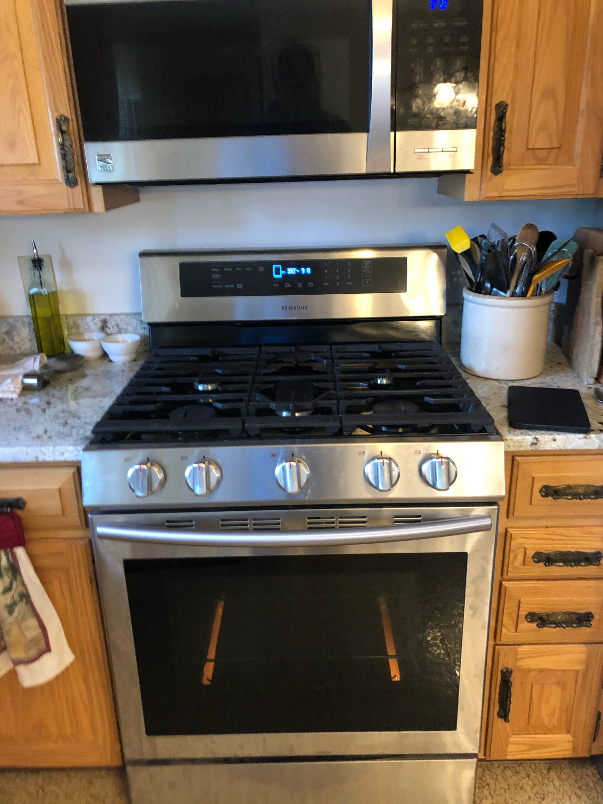 Samsung NX58M6630SS oven being repaired to address high carbon monoxide emissions in North Canton, Ohio.