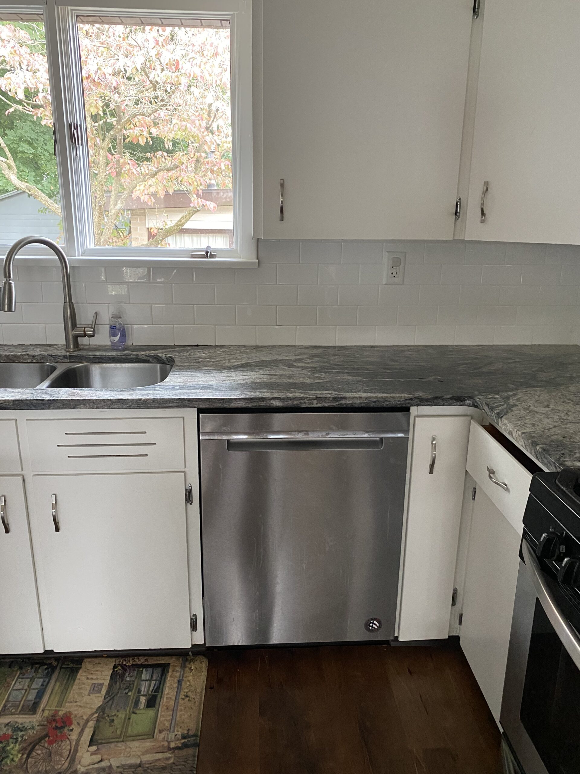 Whirlpool WDTA50SAHZ0 dishwasher upper drawer repair in progress by technician Samuel Willhite.