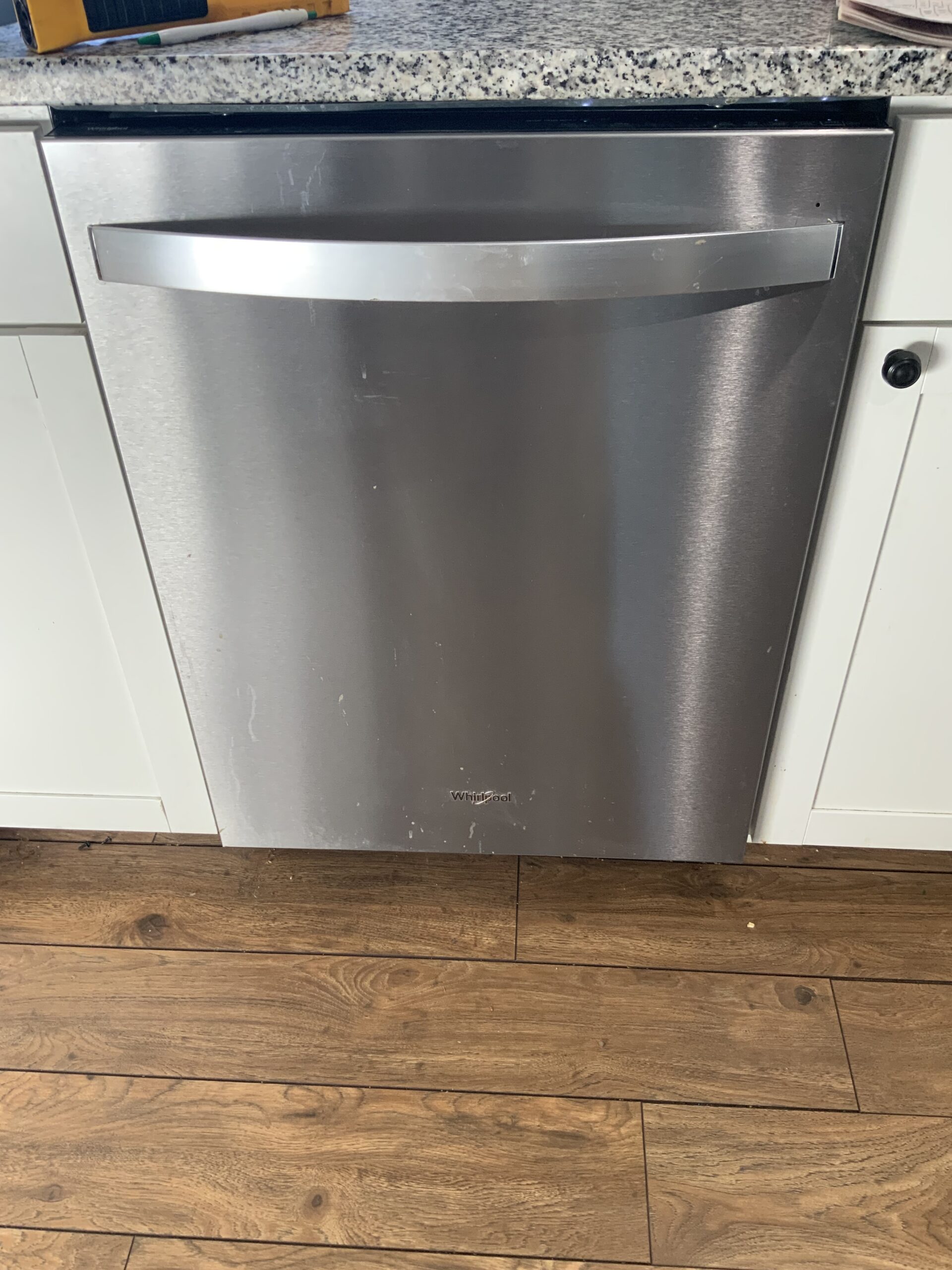 Whirlpool dishwasher model WDT730PAHZ0 with repaired wash pump and motor assembly in Louisville, Ohio.