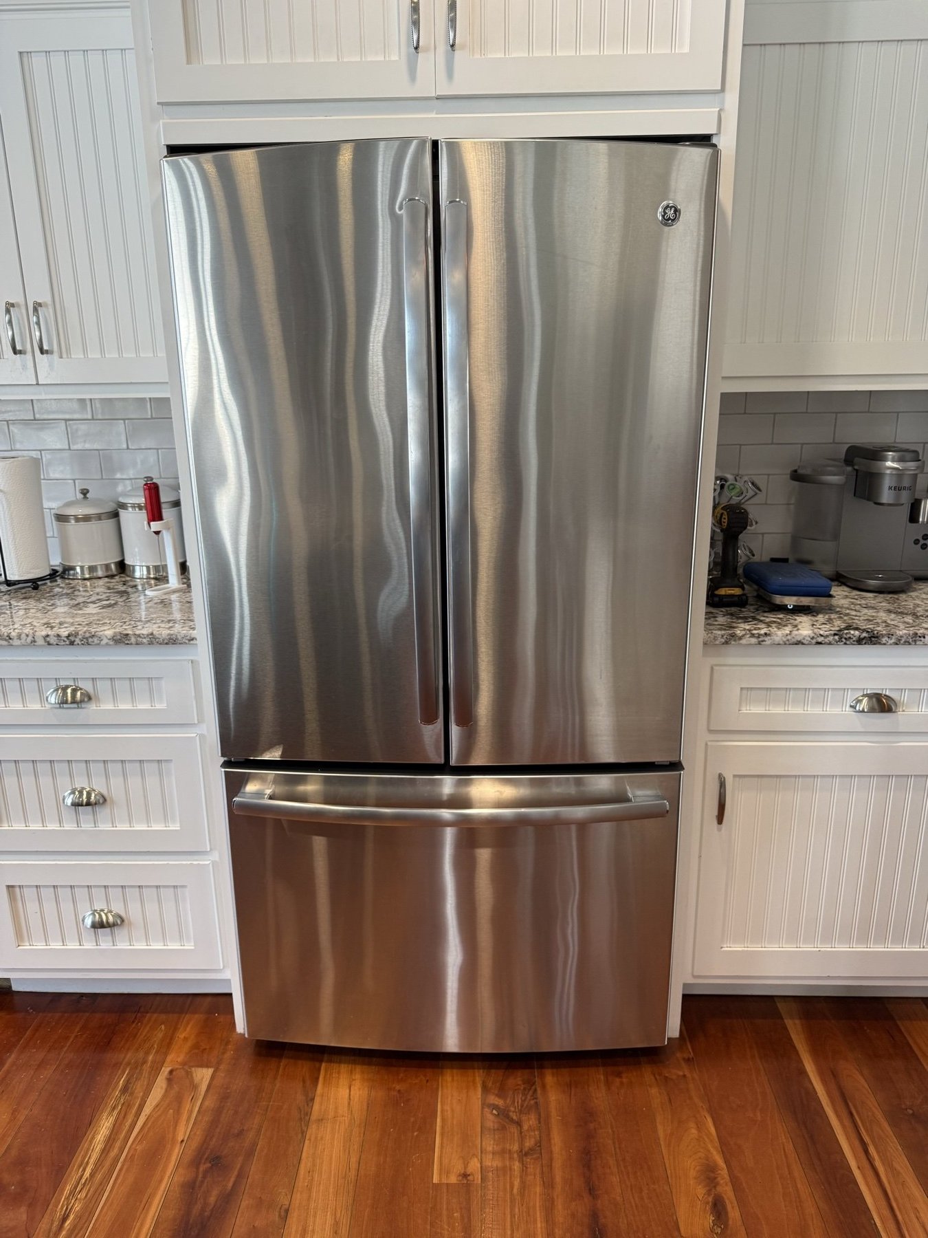 GE French-door refrigerator in a Stark County kitchen — repaired by Louisville Appliance Repair