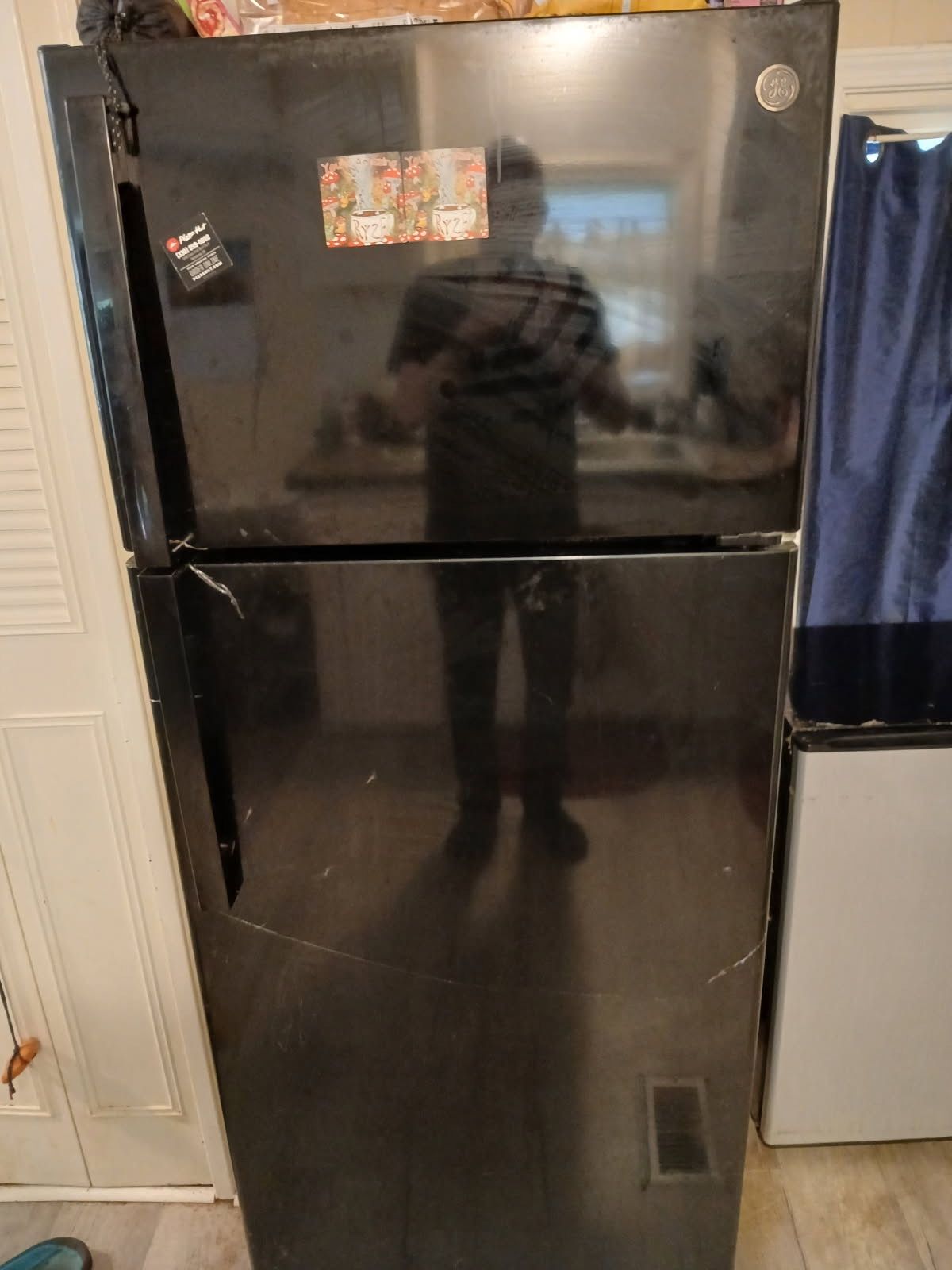 GE Refrigerator repair in Uniontown, Ohio by Louisville Appliance Repair